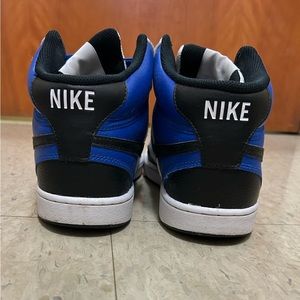 Blue and black Nike Court visions